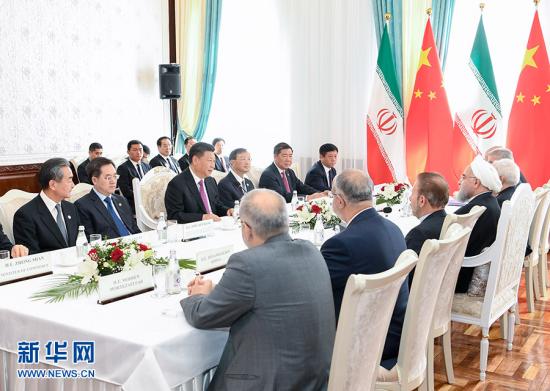 6月14日，国家主席习近平在比什凯克会见伊朗总统鲁哈尼。 新华社记者 高洁 摄 图片来源：新华网