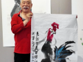 駐馬店日報(bào)創(chuàng)刊40周年 著名畫家李新國雄雞獻(xiàn)禮 祝福駐馬店日報(bào)越辦越好
